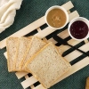 Preparare un panino con burro di arachidi e gelatina