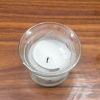 Rimuovere la cera di una candela da un barattolo di candele
