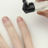 Applicare olio per cuticole