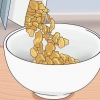 Mangiare cereali per la colazione