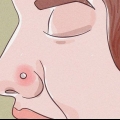 Trattare un piercing al naso infiammato