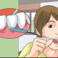 Rimuovi il giallo tra i denti