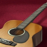 Diminuisci l'azione di una chitarra acustica