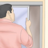 Sostituzione dei rulli di una porta scorrevole in vetro