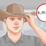 Indossare un cappello da cowboy nel modo giusto
