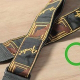 Come attaccare una tracolla per chitarra alla tua chitarra