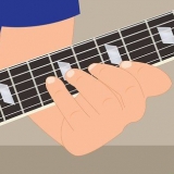 Scrivi un assolo di chitarra