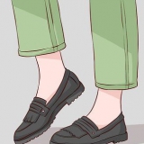 Indossare pantaloni verdi