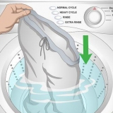 Restringi i pantaloni da jogging