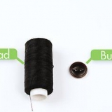 Cuci un bottone