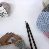 Lavora a maglia una coperta patchwork
