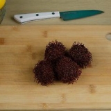Mangiare un rambutan