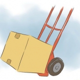 Caricare un furgone in movimento