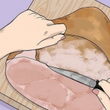 Riscaldare il prosciutto in una pentola a cottura lenta