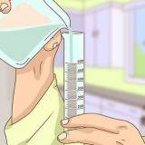 Determinazione del volume di un oggetto irregolare mediante un cilindro graduato