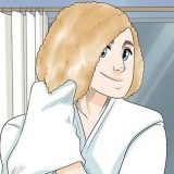 Acconciare i capelli ricci corti