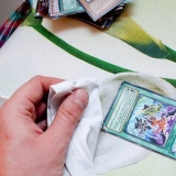 Ripara le carte collezionabili deformate