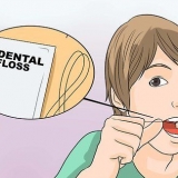 Prendere i popcorn tra i denti