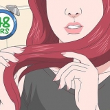 Rimuovi la tintura rossa dai capelli