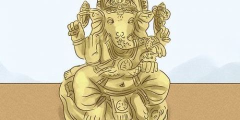 Pregare il dio indù ganesha