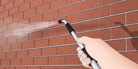 Dipingere una casa di mattoni