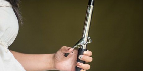 Usando un ferro arricciacapelli a cono