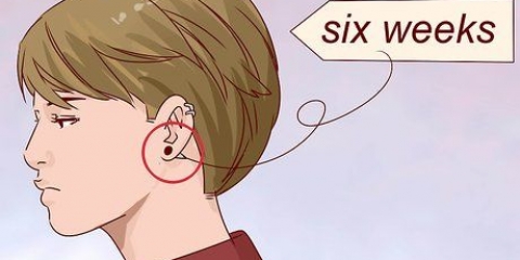 Nascondi un piercing all'orecchio