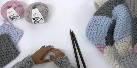 Lavora a maglia una coperta patchwork
