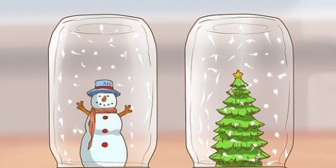 Realizzare un globo di neve in un barattolo
