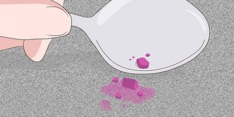 Rimuovere il rossetto dal tappeto