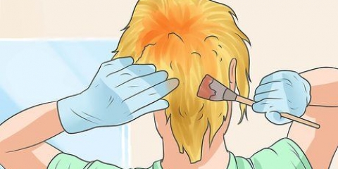 Correggi le radici dei capelli arancioni quando decolori i capelli