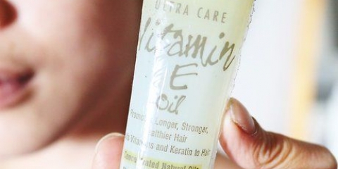 Usando l'olio di vitamina e per i tuoi capelli