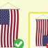 Appendendo la bandiera americana in verticale