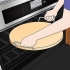 Usando una pietra per pizza