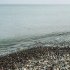 Fai rimbalzare una roccia sull'acqua