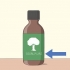 Tratta i brufoli con l'olio dell'albero del tè